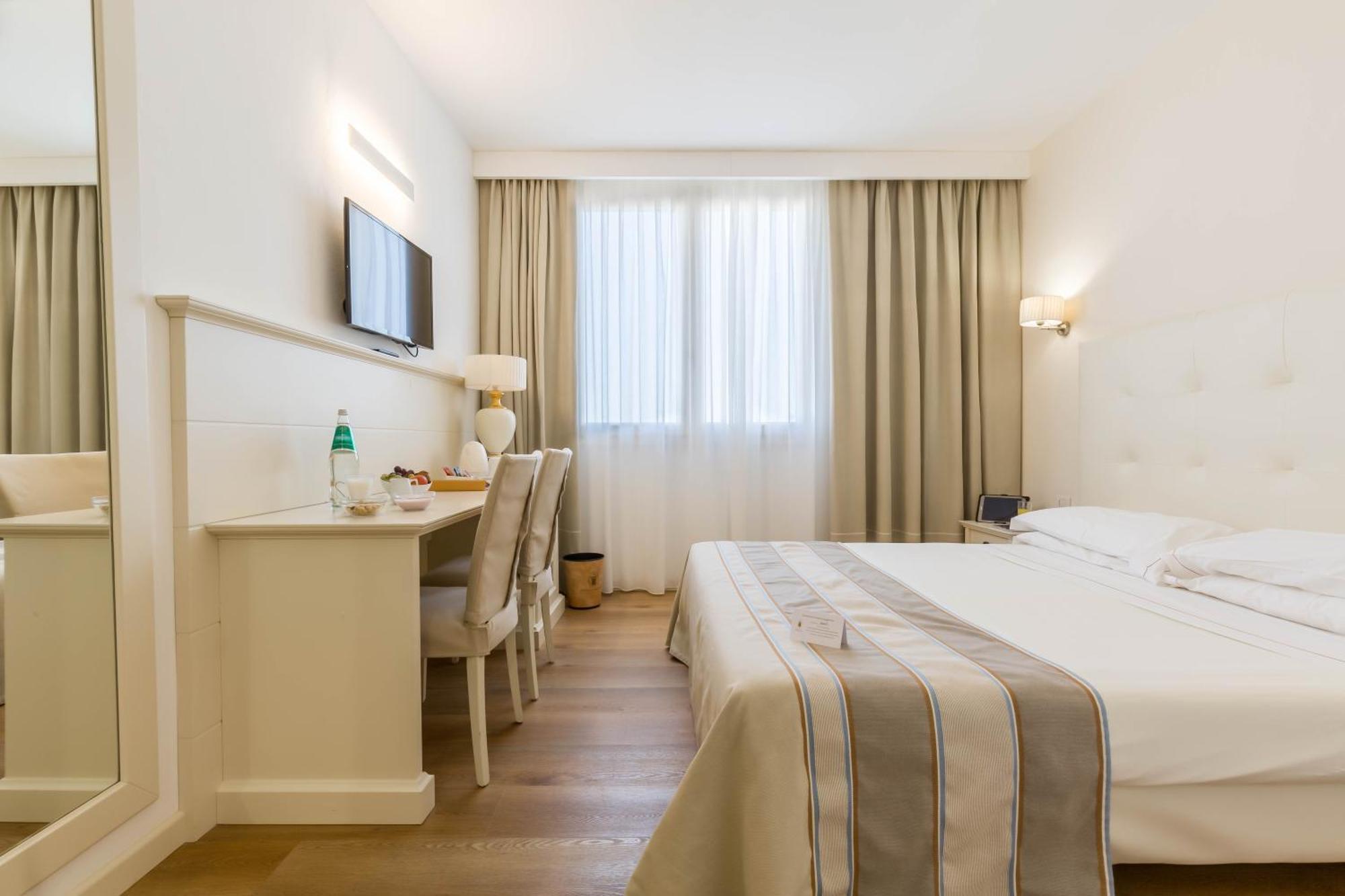 Double or Twin Room with Side Sea View,1588041129:JPEG